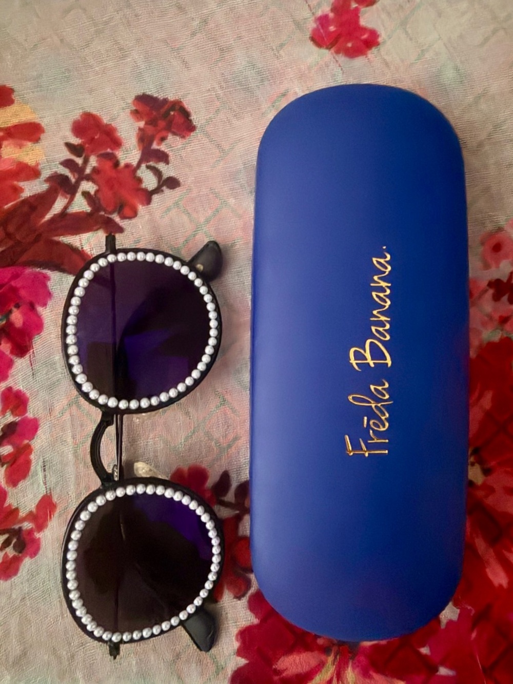 Freda Banana faux pearl sunglasses